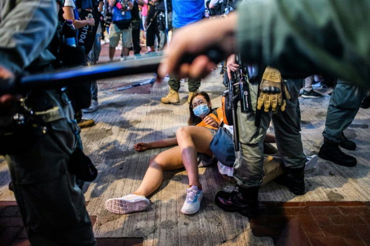 Hong Kong police detained protesters in the city's Causeway Bay district on the one-year anniversary of major clashes between police and pro-democracy demonstrators