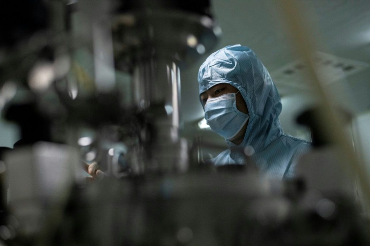 A researcher at the Yisheng Biopharma company lab in Shenyang, one of a number of firms in China trying to develop a vaccine for COVID-19