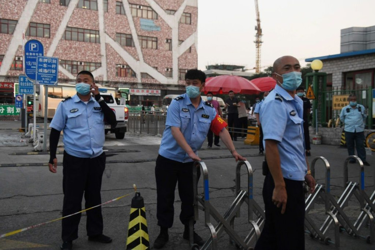 The chairman of the Xinfadi meat wholesale market told state-run Beijing News that the virus was detected on chopping boards used to handle imported salmon