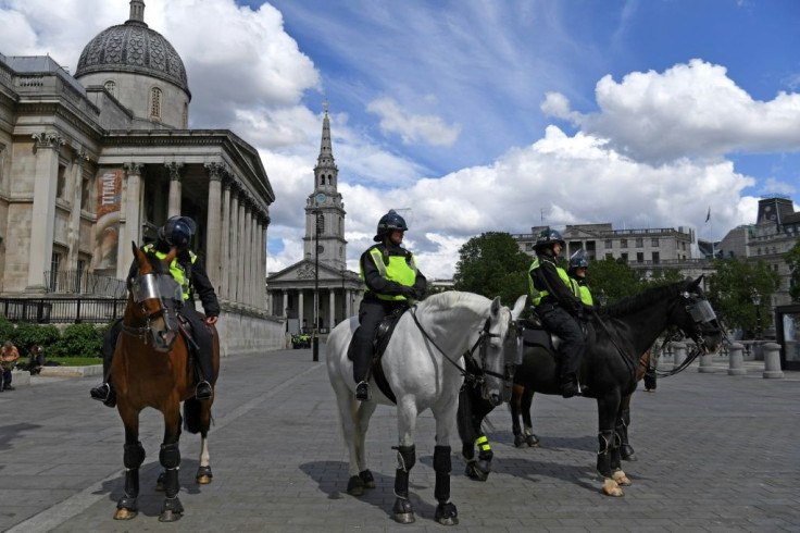 London's Metropolitan Police said those who ignored the pleas not to protest must comply with conditions imposed, including keeping to separate designated areas and dispersing early