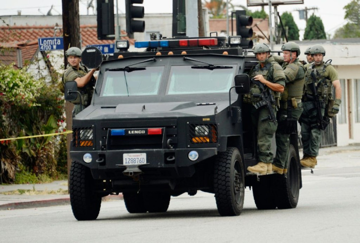 Army or police? Los Angeles police aboard an armored car in 2019