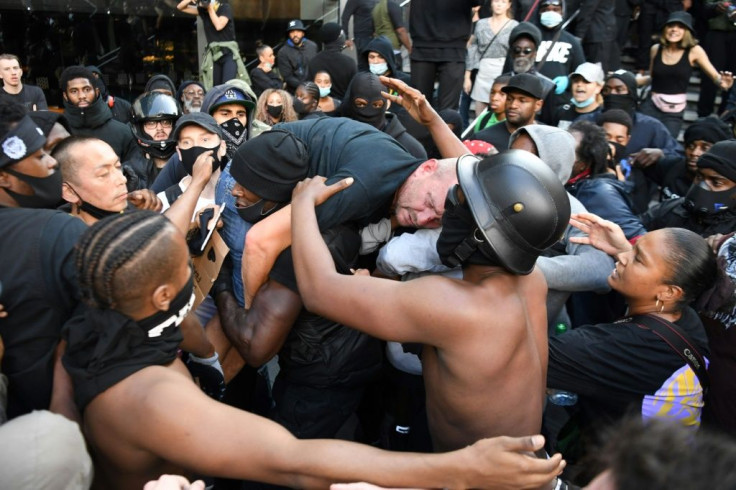 Black Lives Matter demonstrators clashed with rival groups in London
