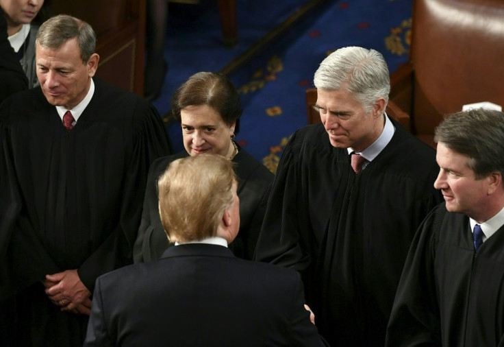 US Supreme Court Justice Neil Gorsuch in February 2019 shaking hands with US President Donald Trump: Gorsuch wrote the majority opinion banning employers from firing LGBT employees on the basis of their sexual orientation