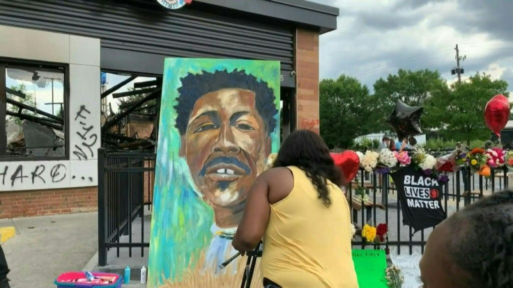 Atlanta residents gather at site where Rayshard Brooks was killed