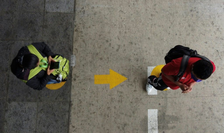 People respecting social distancing measures in Ecuador's capital Quito