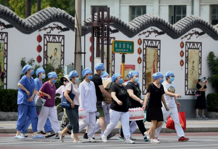 Authorities in the Chinese capital Beijing are rushing to contain a new outbreak of the coronavirus linked to a wholesale food market