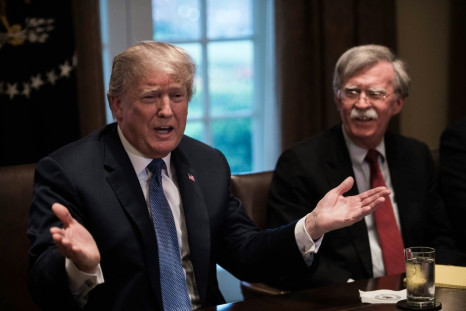 John Bolton (R), here with President Trump in April 2018, is believed to have taken meticulous notes during his time at the White House