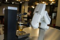 No need to tip, a robot now pulls beers at one bar in the Spanish city of Seville