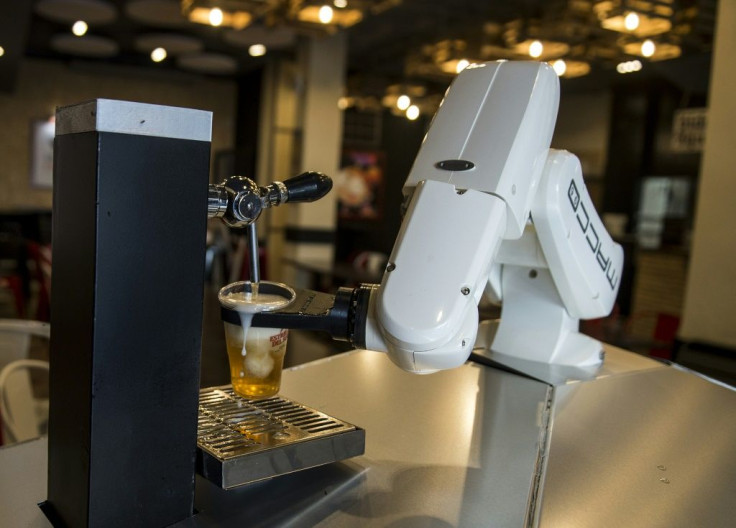 No need to tip, a robot now pulls beers at one bar in the Spanish city of Seville