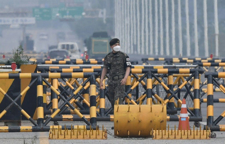 A South Korean soldier stands at a checkpoint on the Tongil bridge near the Demilitarized Zone (DMZ) dividing the two Koreas