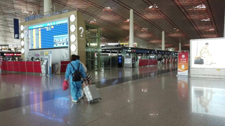 Beijing's airports cancel more than 1,200 flights as authorities rush to contain a new coronavirus outbreak linked to a wholesale food market.