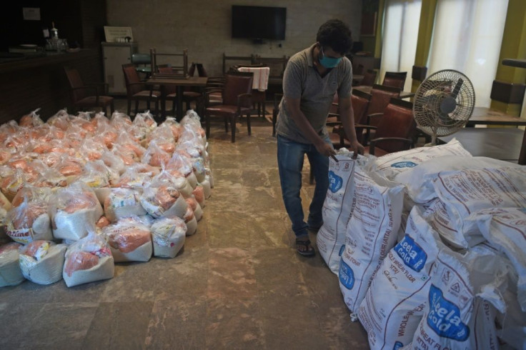 Food packets are prepared by the Mumbai Press Club to be distributed to journalists laid off during the current COVID-19 pandemic and economic crisis, in Mumbai