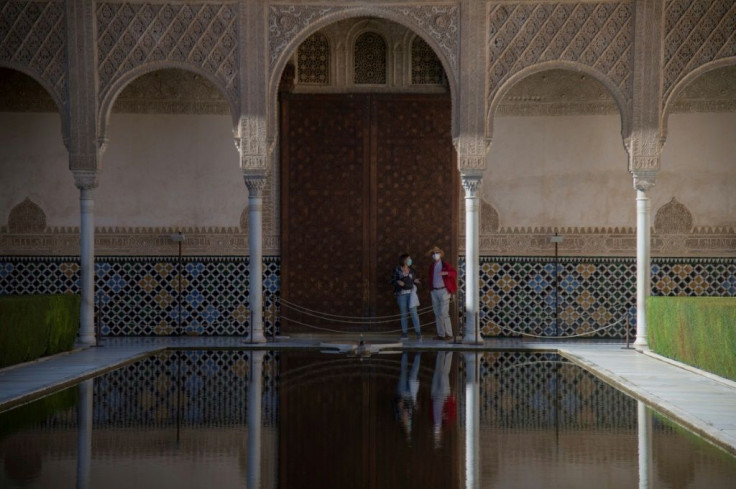 For now, only residents of the southern city of Granada were allowed to visit the Alhambra, offering them a rare pleasure free of the normal crowds