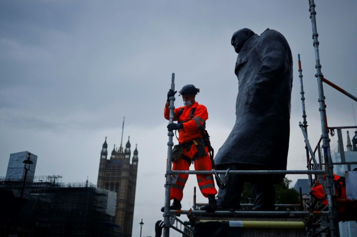 A statue of Churchill that was controversially boxed up after anti-racism protests will be uncovered for Macron's visit