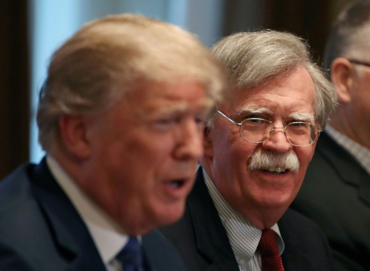 John Bolton, then national security advisor, listens to US President Donald Trump in an April 2018 meeting in the Cabinet Room