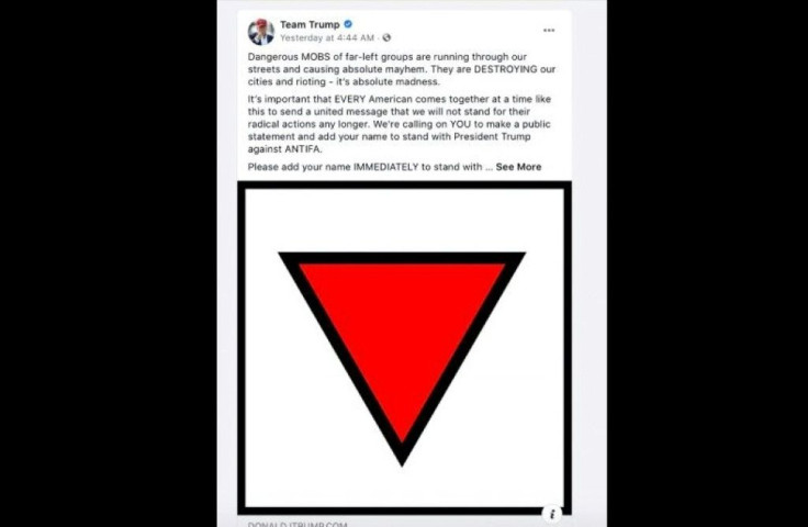 This computer screen capture shows a removed Trump campaign ad that appeared in feeds on Facebook on June 18, 2020 and contained a symbol used in Nazi Germany for political prisoners