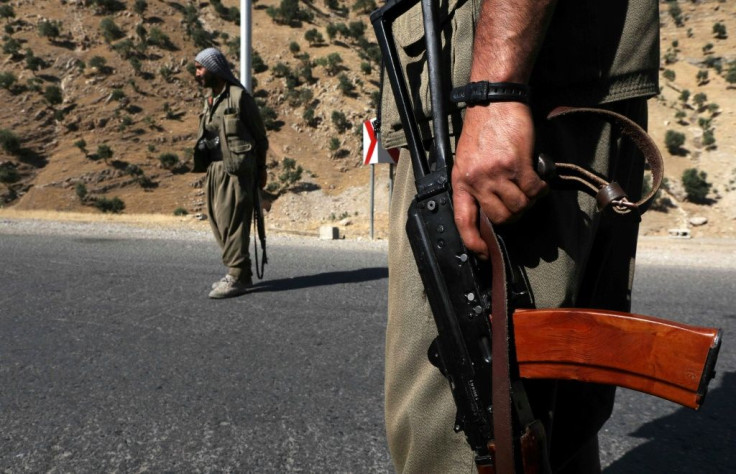 A 2018 file photo shows fighters of the rebel Kurdistan Workers' Party (PKK) manning a roadblock in the Qandil Mountains, the groups's main rear-base in northern Iraq