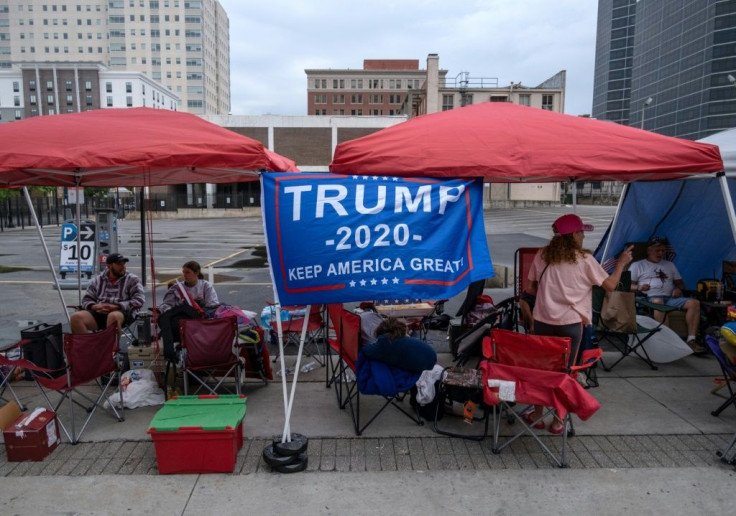 Diehard supporters of US President Donald Trump camp near the BOK Center in Tulsa, Oklahoma, ahead of Trump's rally