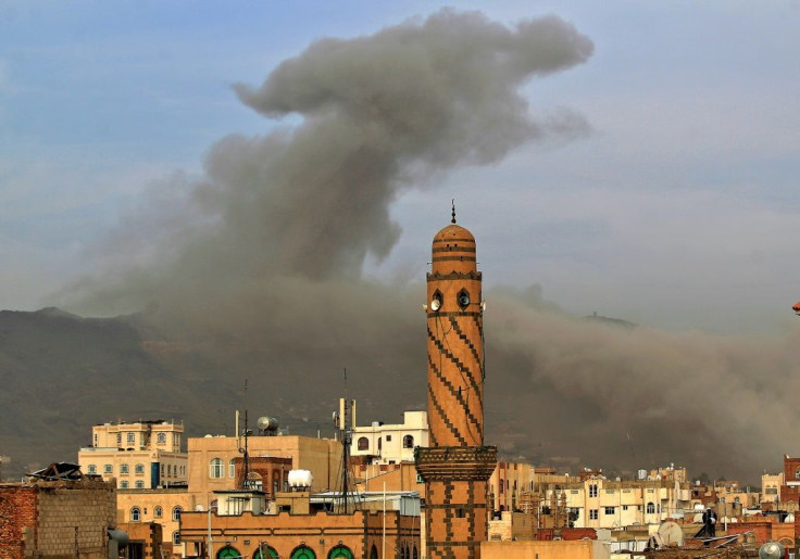 Smoke billows following an airstrike by the Saudi-led coalition in the Yemeni capital Sanaa, on June 16, 2020