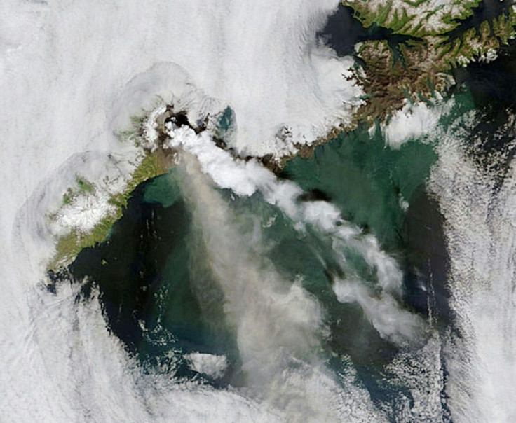 Okmok Volcano, in Alaskaâs Aleutian Islands, released a continuous plume of ash and steam in early July 2008 as seen in this NASA satellite handout image