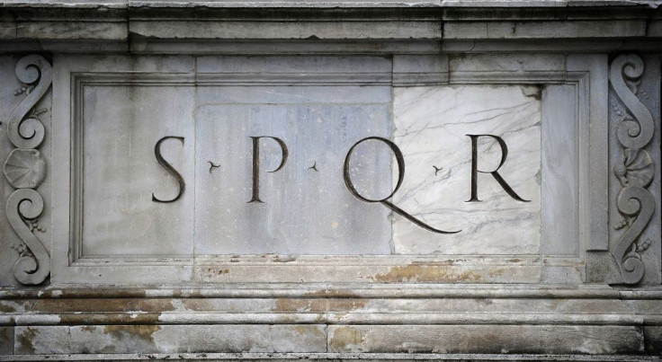 The Latin phrase Senatus Populusque Romanus (The Senate and the People of Rome), referring to the government of the ancient Roman Republic