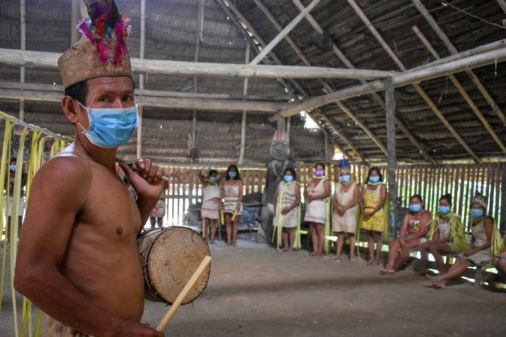 The Articulation of the Indigenous Peoples of Brazil group has accused the national government of doing "nothing" to protect indigenous tribes, such as the Ticuna community (members pictured), from the coronavirus
