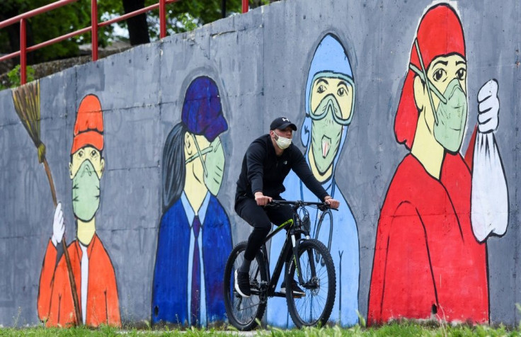 A mural in Skopje inspired by the coronavirus illustrates the measures voters will have to go to when the ballot opens in July