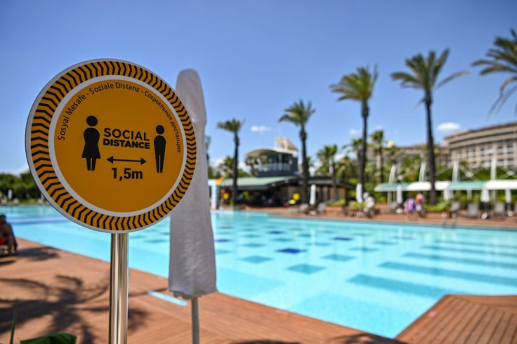 "People are careful, they spend their holidays respecting social distancing rules," sunbather Deniz Kaya saidÂ