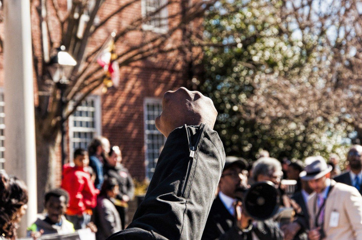 armed protesters march peacefully towards the Oklahoma governor's mansion