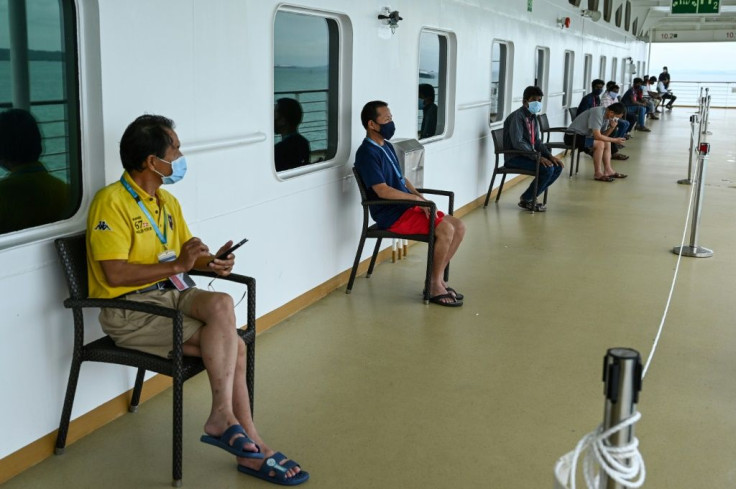 Migrant workers recovering from coronavirus were housed aboard a cruise ship anchored off Singapore after a wave of infections swept through dormitories housing foreign labourers