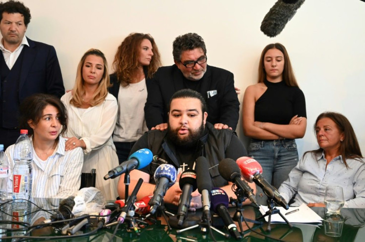"Behind the chokehold, there is a state of mind, an unease," Chouviat's widow, Doria, told a press conference