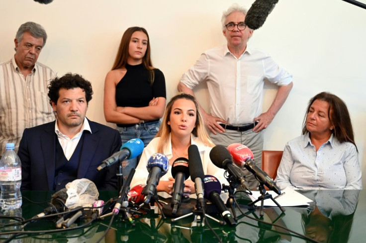 Sofia Chouviat, centre, daughter of Cedric Chauviat, said Tuesday that "We don't understand why this chokehold technique still hasn't been banned."