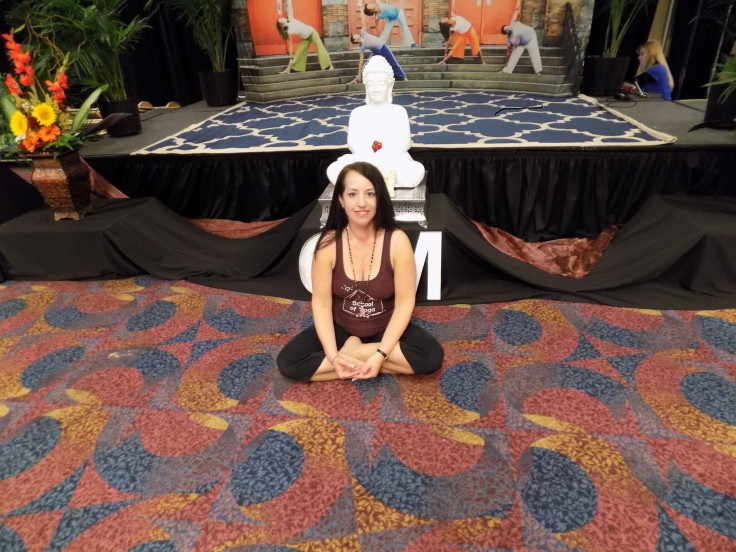 Doreen Foxwell, here at the National Yoga Journal Conference in New York City, runs yoga schools in several states.