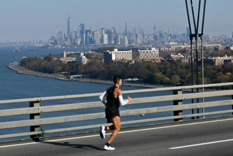 A runner participates in the November 2019 New York Marathon, whose 2020 edition has been canceled
