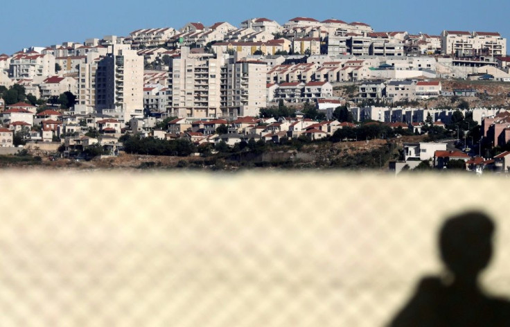 A picture taken from the Palestinian village of Qirah, south of Nablus, shows the Israeli settlement of Ariel as Israel debates annexation