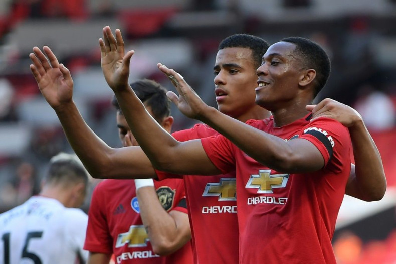 Anthony Martial (right) scored his first career hat-trick for Manchester United