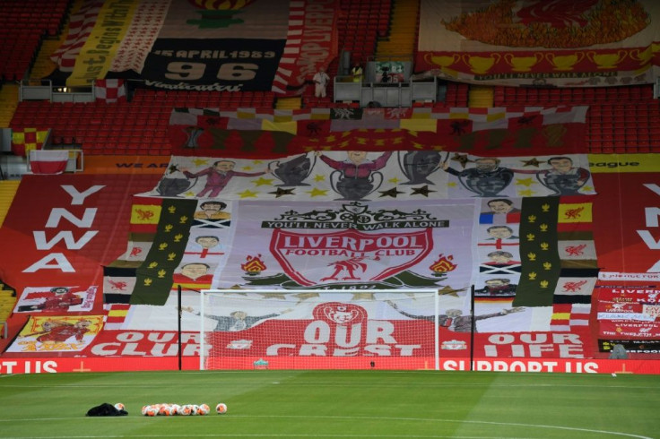 Liverpool's famous Kop end was draped in flags for Anfield's return behind closed doors