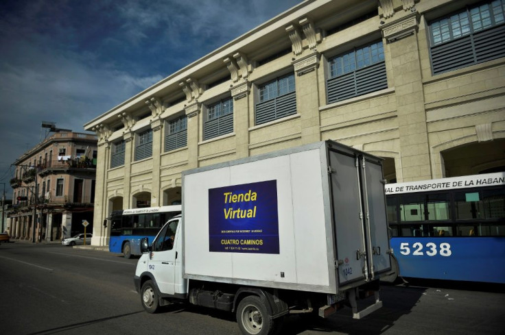 A virtual store truck drives along a street in Havana on June 17, 2020