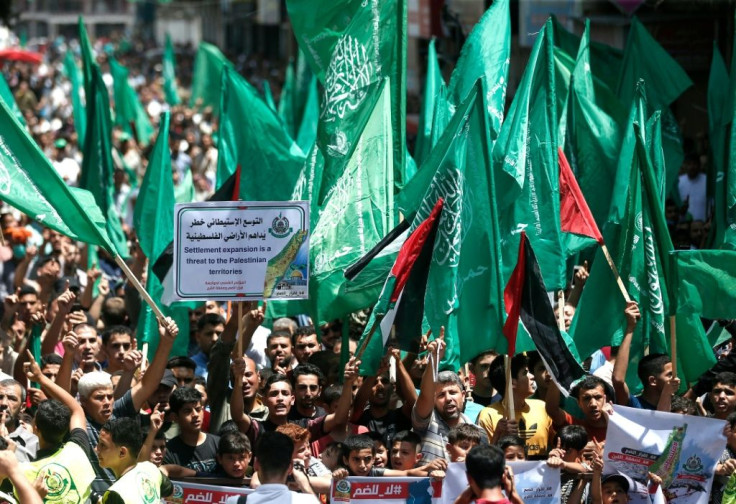 Hamas supporters protest in the Gaza Strip against Israel's plans to annex parts of the occupied West Bank