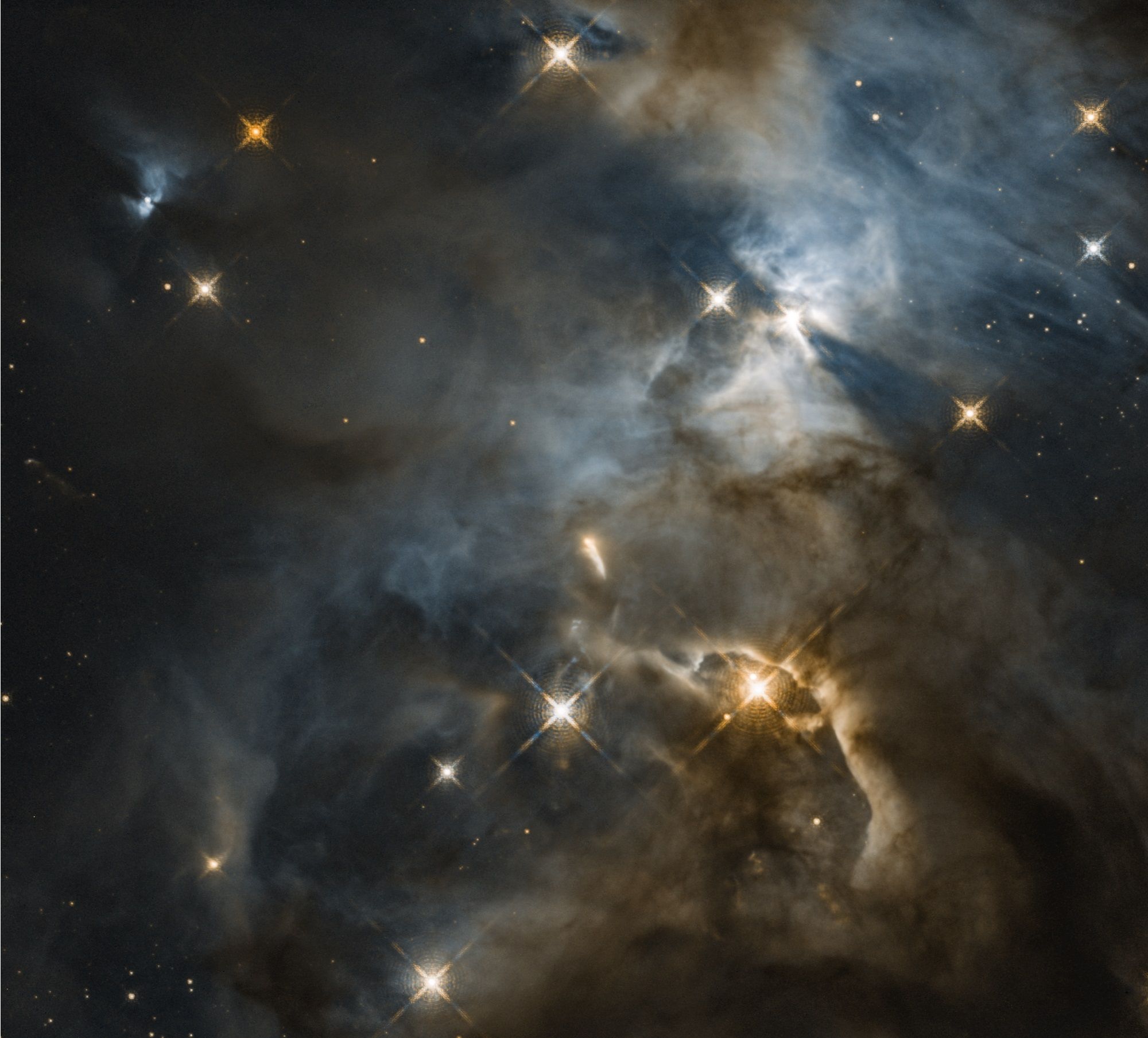 NASA's Hubble Spots Cosmic Flapping ‘Bat Shadow’ Made By Young Star ...