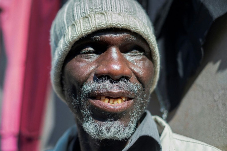 Enok Mukanhairi says that facial covers are another handicap for blind people -- it becomes a lot harder to identify someone speaking from behind a mask