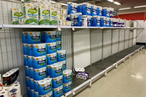 Near-empty shelves of toilet paper in a Melbourne supermarket