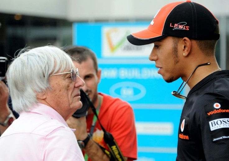 Controversial remarks: Bernie Ecclestone with Lewis Hamilton