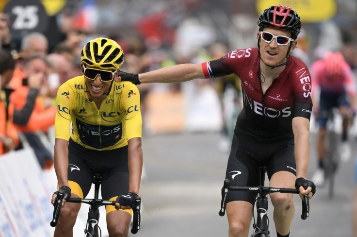 Colombia's Egan Bernal in the yellow jersey in 2019 is congratulated by teammate and 2018 champion Britain's Geraint Thomas