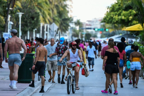 Fun-seekers out and about on Ocean Drive in Miami Beach, Florida on June 26, 2020 -- itching for a good time after months of lockdown