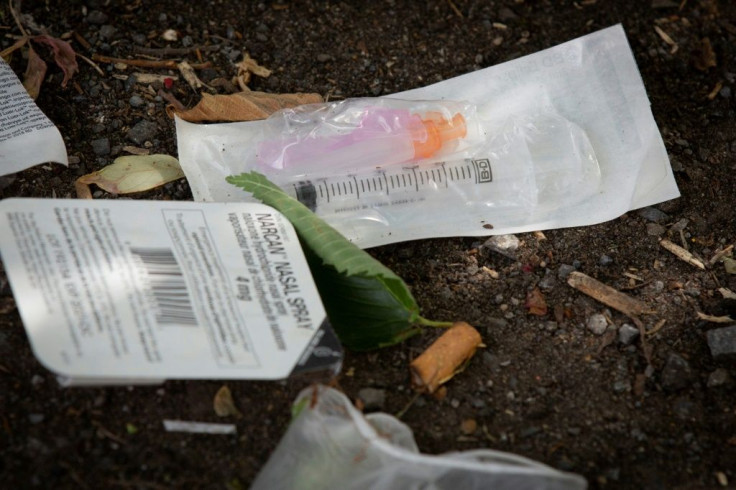 A drug syringe and nasal overdose prevention drug can be seen near a popular drug spot in Ottawa, Canada on June 25, 2020