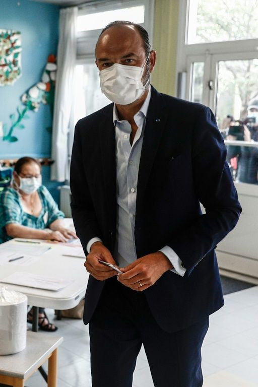 Prime Minister Edouard Philippe, campaigning for Le Havre city hall, has seen his popularity rise beyond that of President Macron -- who may axe him