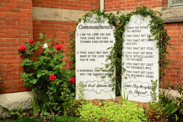 man takes down monument of the ten commandments