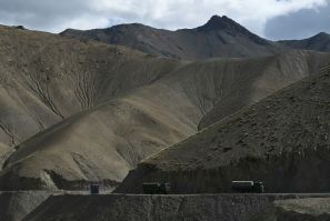 An Indian military convoy drives towards Leh in the Ladakh region