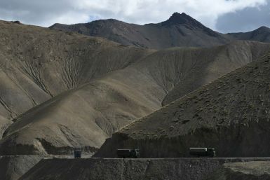 An Indian military convoy drives towards Leh in the Ladakh region